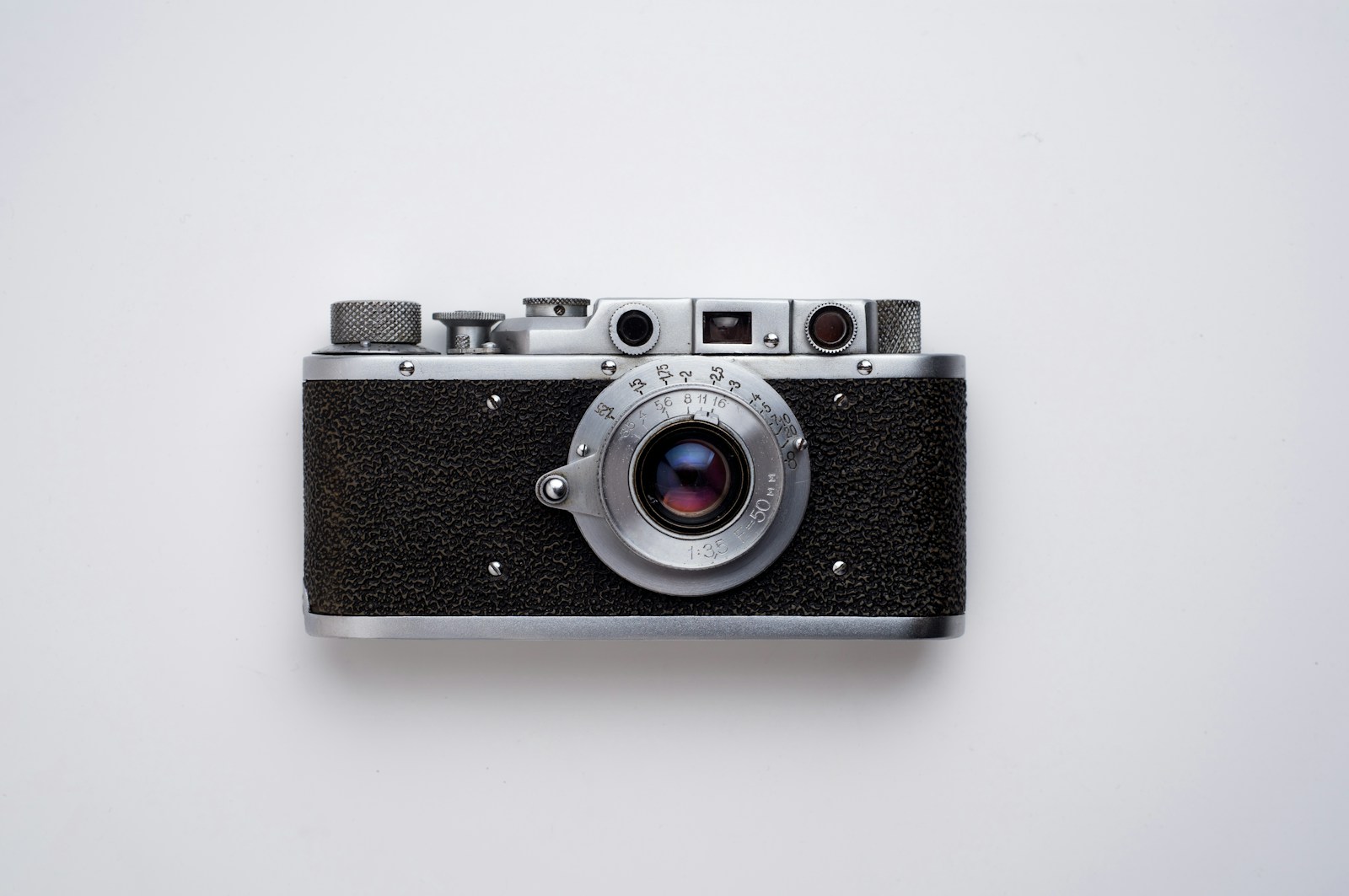 Silver and black vintage rangefinder camera